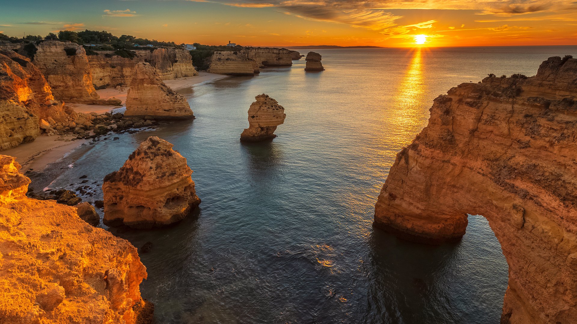 Soaring cliffs and golden beaches